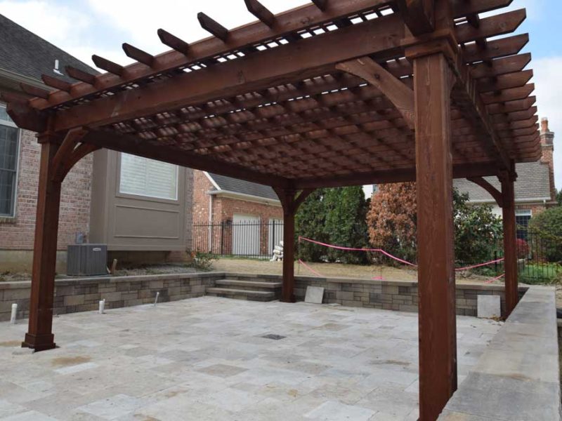 Stained Wood Pergola Over Pool Deck