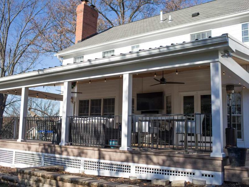 Covered Deck Wood Ceiling White Columns Black Railing