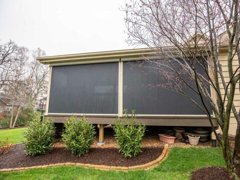 California Custom Decks retractable screen room with open deck and fireplace