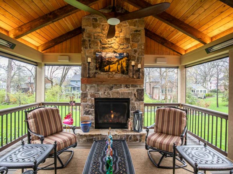 California Custom Decks retractable screen room with open deck and fireplace