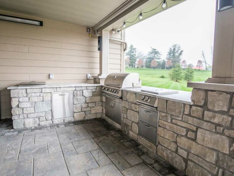 California Custom Decks custom deck and covered patio below and custom outdoor kitchen