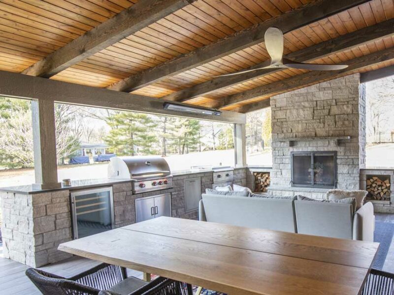 Outdoor fireplaces design - stone wood burning fireplace and custom outdoor kitchen
