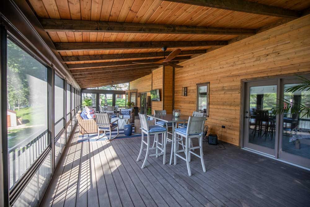 Lake House Three Season Sunroom with Under Deck Patio + Outdoor Kitchen at Holiday Lake, IL