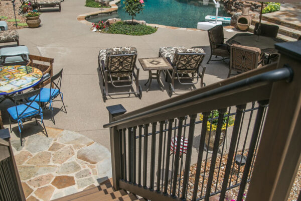 Decks stairs leading to patio and pool in Creve Coeur, MO