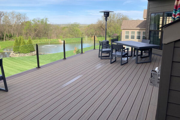 Open deck with glass railing in Creve Coeur, MO