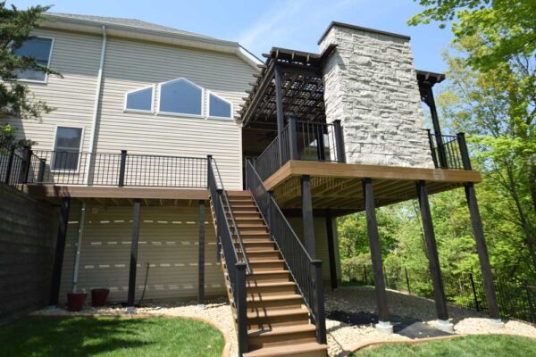 Pergola with stone fireplace in Chesterfield, MO