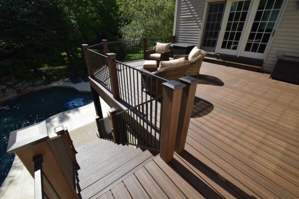 Open deck and deck stairs overlooking pool in Chesterfield, MO