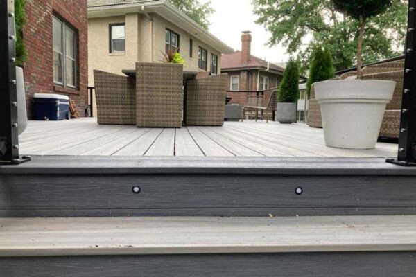 Grey composite deck and stair lights in Clayton, MO