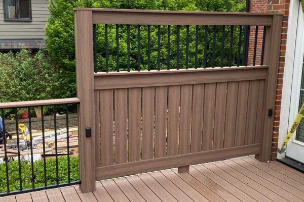 Decking privacy wall on open deck in Clayton, MO