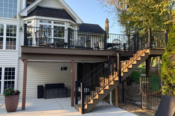 Open custom composite deck and stairs in Des Peres, MO