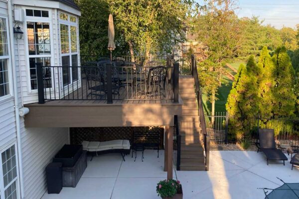 Open custom composite deck and stairs in Des Peres, MO