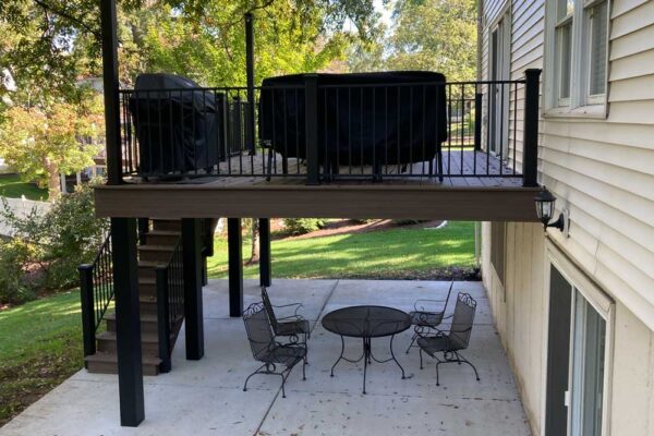 Open custom composite deck and stairs in Des Peres, MO