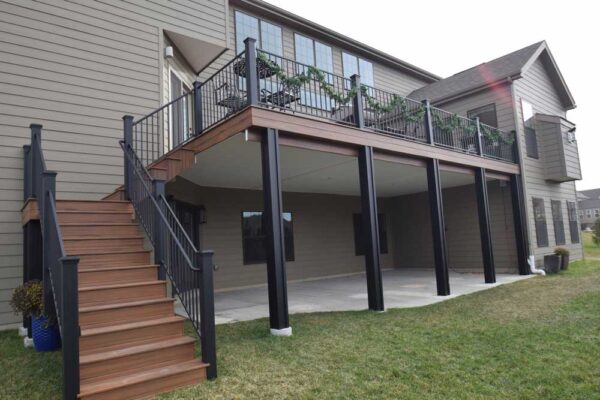 Open custom composite deck and stairs in Des Peres, MO