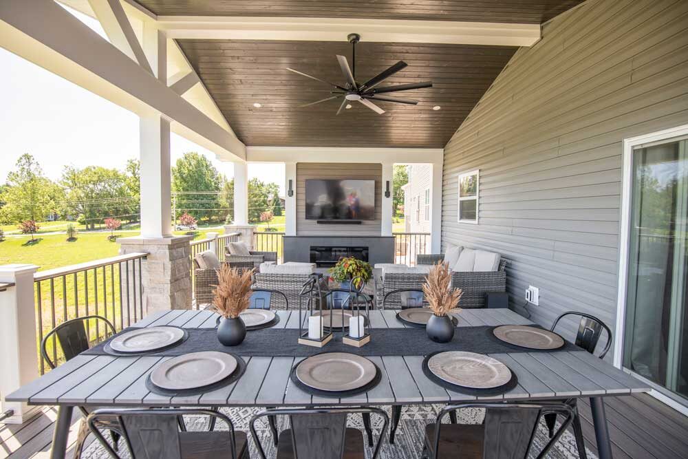 Covered deck with tv over gas fireplace in Fenton, MO