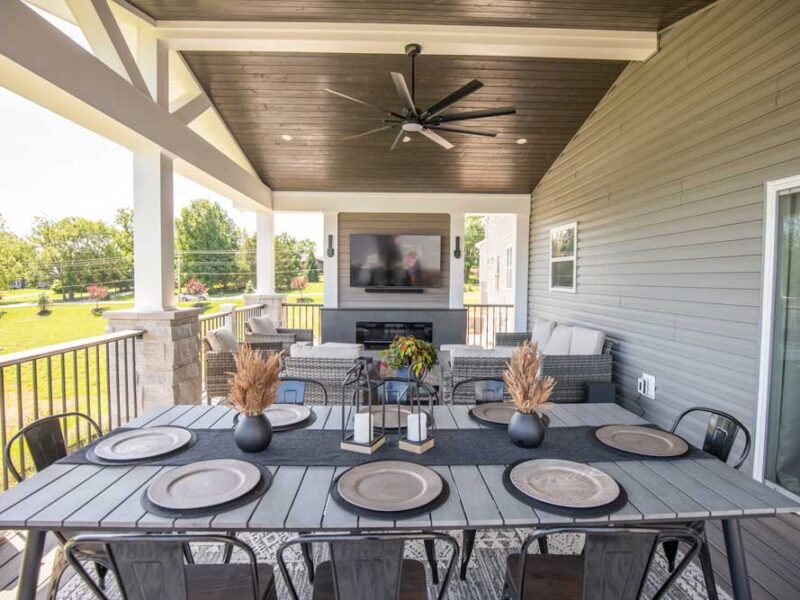 Covered deck with tv over gas fireplace in Fenton, MO