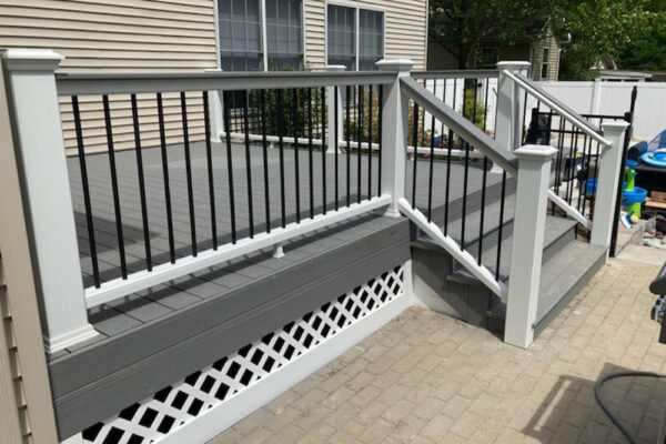 Open deck grey color with white posts in Kirkwood, MO