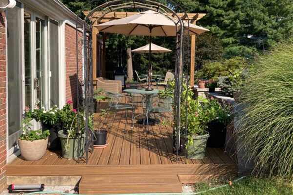 Wood pergola with shade over custom deck in Ladue, MO