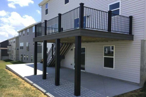 New custom composite wood deck with black railings in Manchester, MO