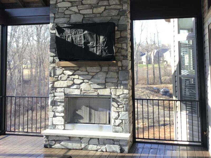 Screen Room with stone fireplace in St. Charles County, MO