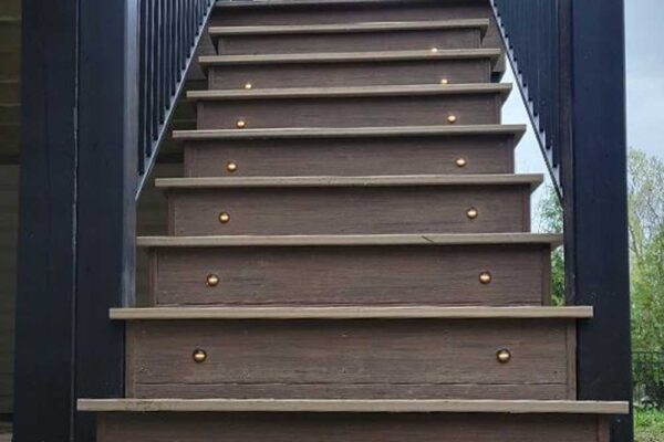 Deck stair lights and black railings in St. Charles County, MO