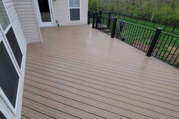 New custom composite wood deck with black railings in St. Charles County, MO