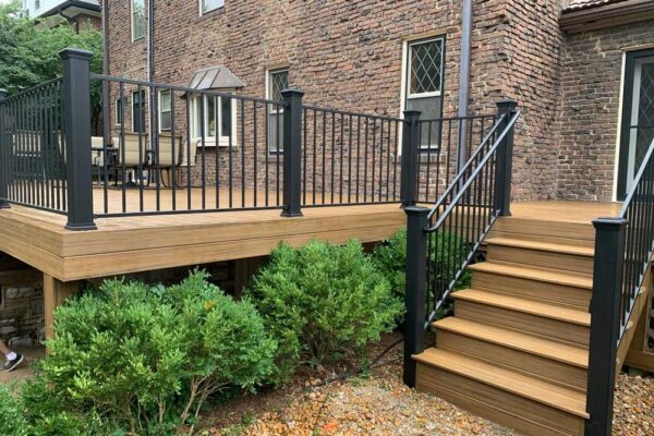 Open deck and deck stairs with black railing in St. Louis City, MO