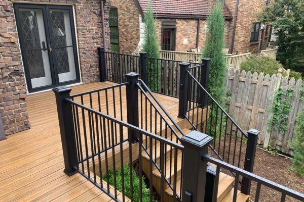 Open deck and deck stairs with black railing in St. Louis City, MO