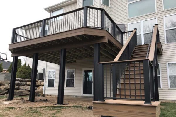 Custom composite wood deck with black railing in Sunset Hills, MO