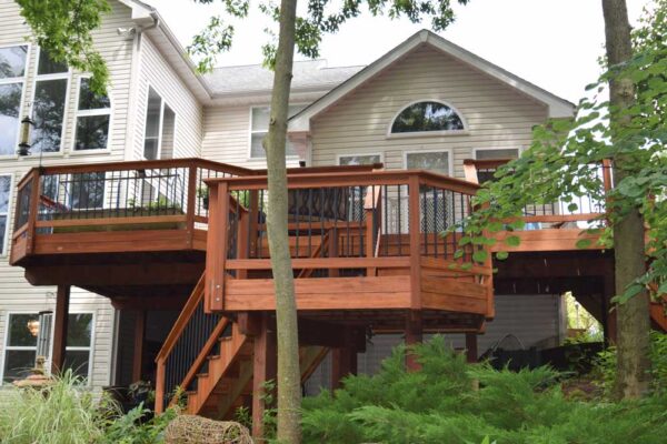 Real wood deck with black railing in Sunset Hills, MO