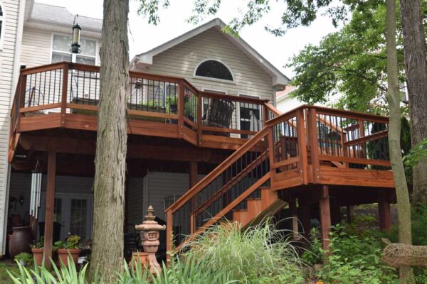 Real wood deck with black railing in Sunset Hills, MO