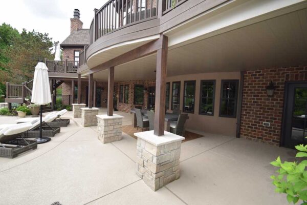 Open deck and under deck patio by pool in Town & Country, MO