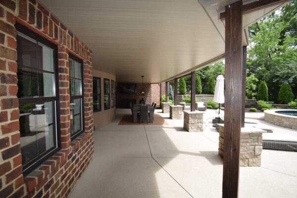 Under deck patio by pool in Town & Country, MO