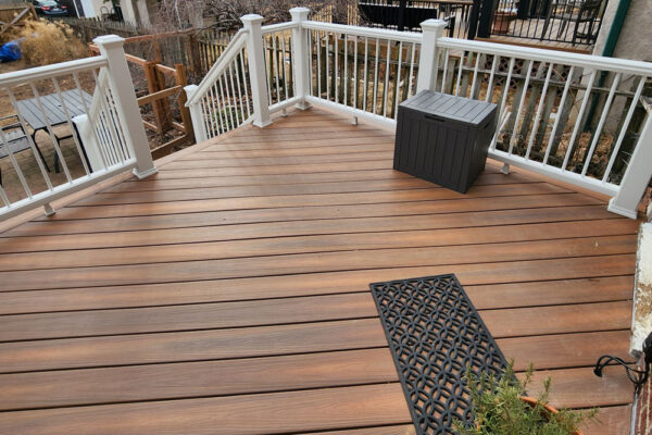 Open deck with white railing in University City, MO