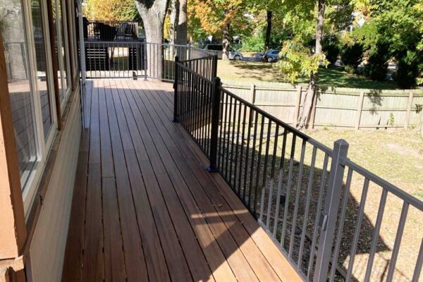 Open deck with black railing in Webster Groves, MO