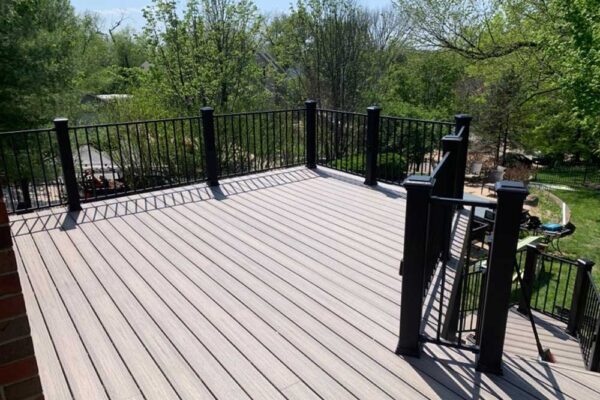 Open deck with black railing in Webster Groves, MO