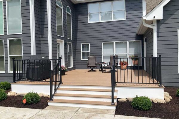 Open deck with black railing in Wildwood, MO