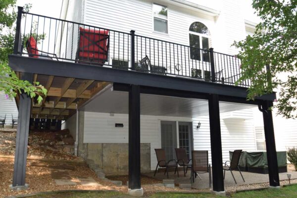 Open deck with black railing in Wildwood, MO