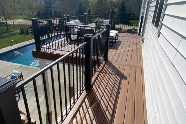 Open deck with black railing in Wildwood, MO