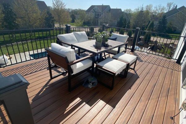 Open deck with black railing in Wildwood, MO