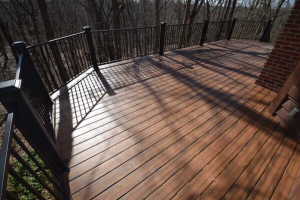 Open deck with black railing in Wildwood, MO