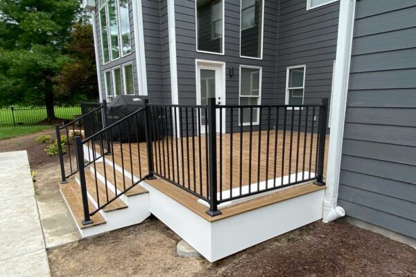 Open deck with black railing in Wildwood, MO